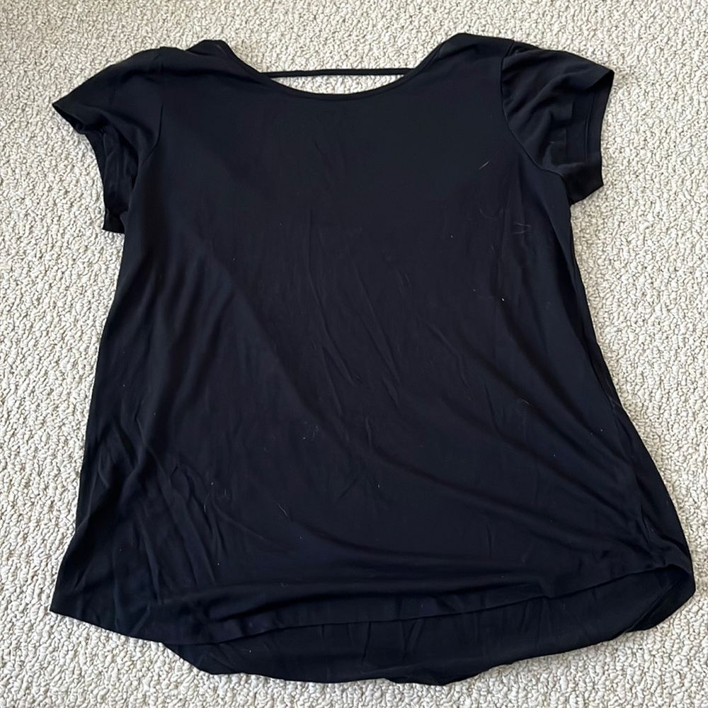 Super cute black open back T-shirt